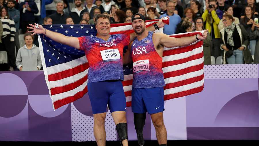 PARIS, FRANCE - SEPTEMBER 05 Bronze medalist David Blair and Gold medalist Jeremy Campbell of Team United States pose for a photo after the Men&apos;s Discus F64 on day eight of the Paris 2024 Summer Paralympic Games at Stade de France on September 05, 2024 in Paris, France. (Photo by Ezra Shaw/Getty Images)